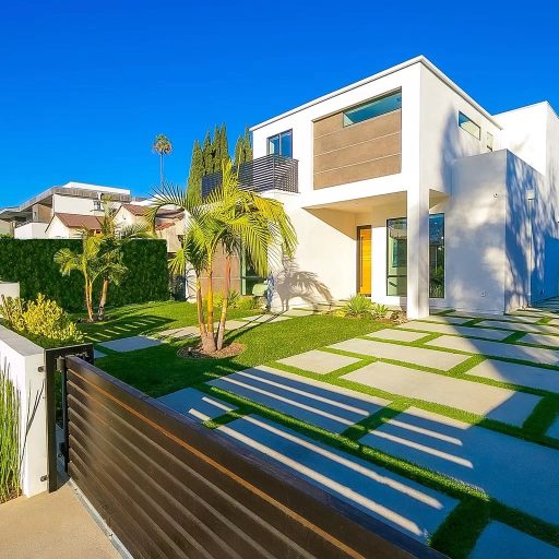 Modern white house with landscaped yard