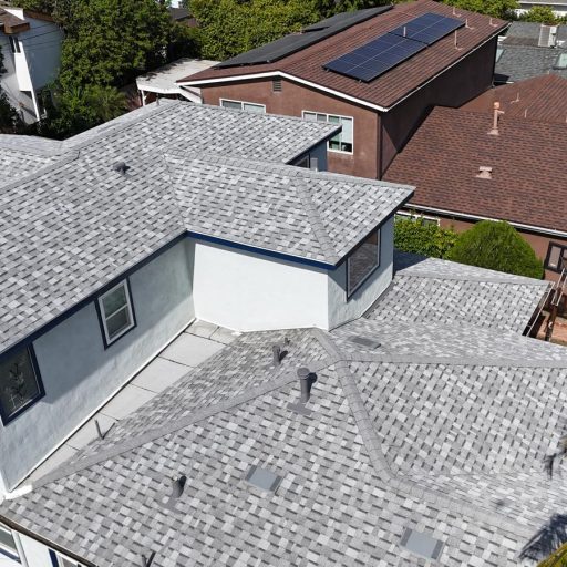 Houses with gray and brown colored roofs.