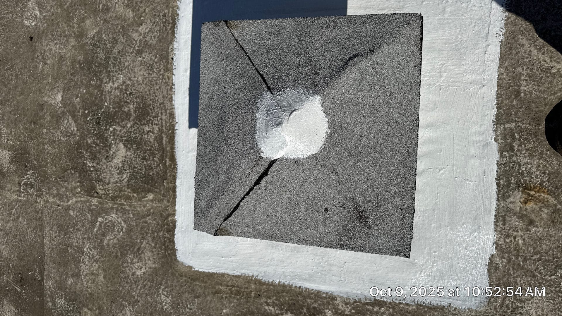 Cracked flat roof cap sealed with white elastomeric coating patch in West Hollywood | Hollywood Contractor Corp Cracked flat roof cap sealed with white elastomeric coating patch — West Hollywood — Hollywood Contractor Corp