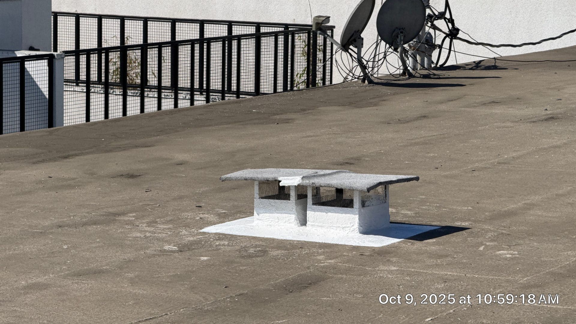 Flat roof with painted masonry vent, mesh screening, satellite dishes in West Hollywood | Hollywood Contractor Corp Flat roof with painted masonry vent, mesh screening, satellite dishes — West Hollywood — Hollywood Contractor Corp