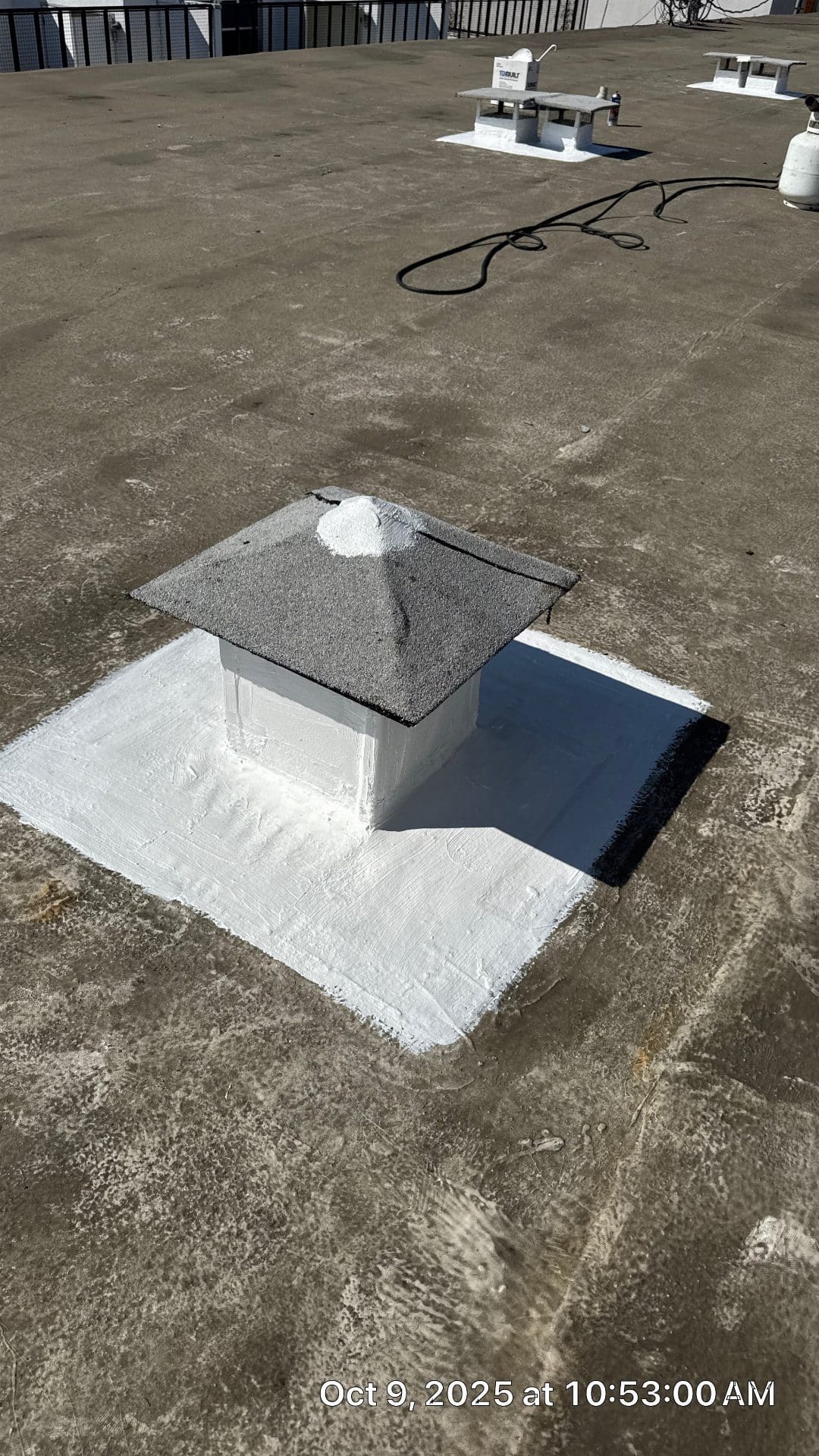 Flat roof vent curb sealed with white elastomeric coating, granulated cap in West Hollywood | Hollywood Contractor Corp Flat roof vent curb sealed with white elastomeric coating, granulated cap — West Hollywood — Hollywood Contractor Corp
