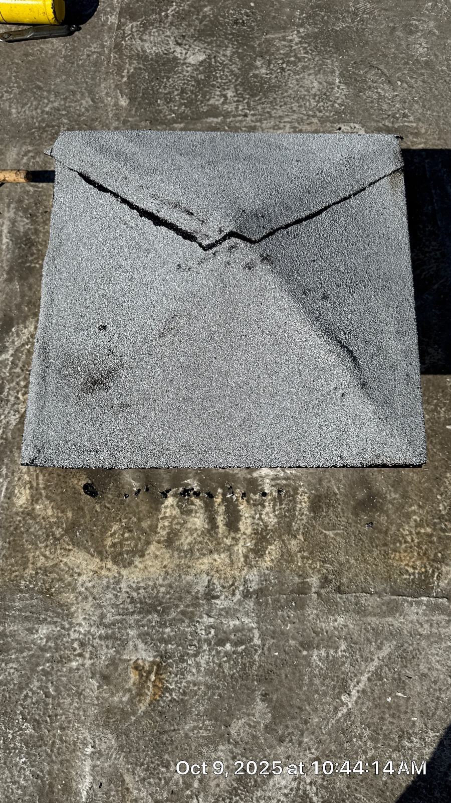 Cracked modified bitumen roofing patch on flat roof surface in West Hollywood | Hollywood Contractor Corp Cracked modified bitumen roofing patch on flat roof surface — West Hollywood — Hollywood Contractor Corp