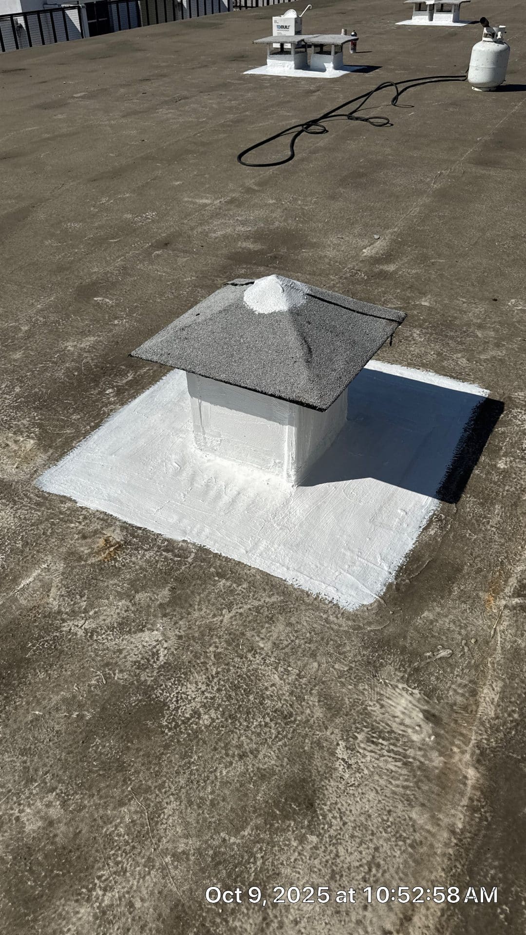 Flat roof vent curb with white elastomeric coating and modified bitumen cap in West Hollywood | Hollywood Contractor Corp Flat roof vent curb with white elastomeric coating and modified bitumen cap — West Hollywood — Hollywood Contractor Corp